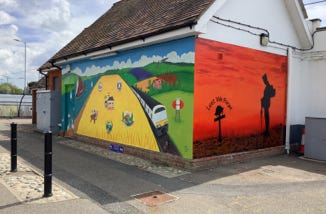 A photo of two murals painted at South Woodham Ferrers Railway Station